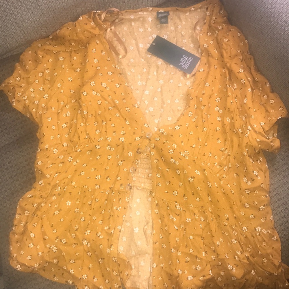 Floral print button down shirt.